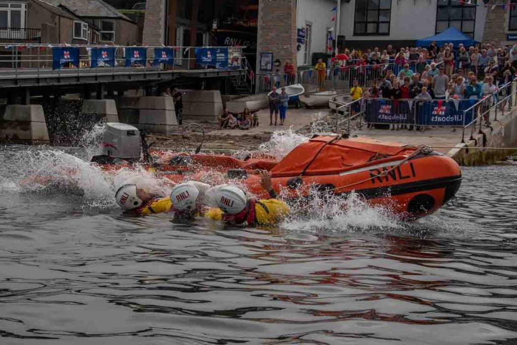 Swanage volunteer lifeboat crew demonstrate D class capsize training lifeboat righted all done